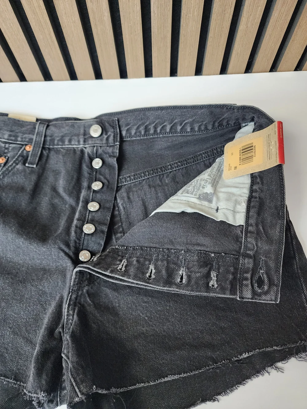 Levis rise new button